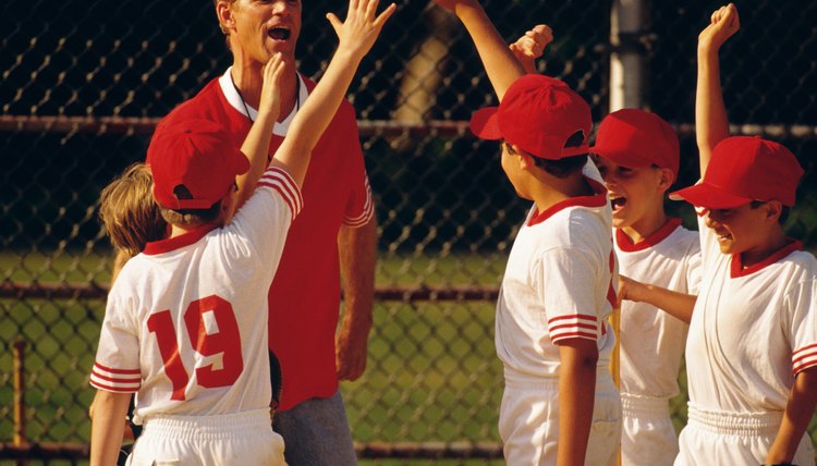 Baseball coach and team cheering