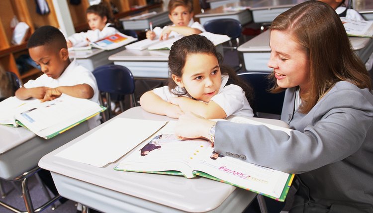 Teachers help students identify story details.