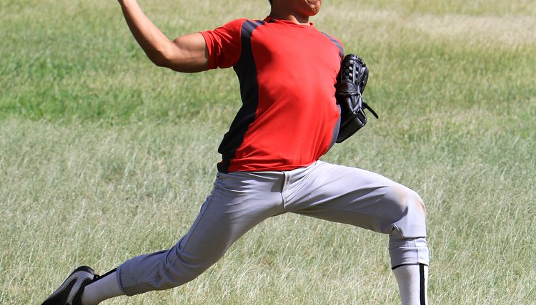 Baseball player throws a ball with strength