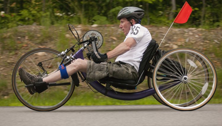 Man with spinal cord injury participating in a handcycle race