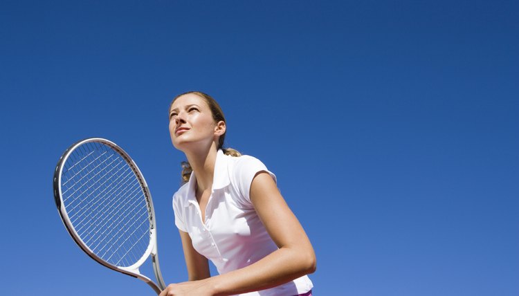 Low angle view of woman playing tennis