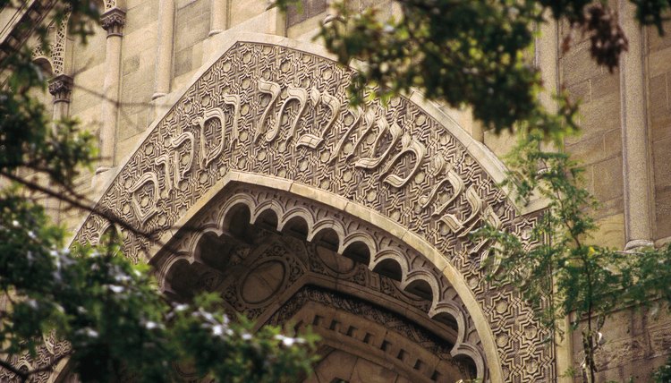 Jews perform ritual atonement in synagogue on Yom Kippur.