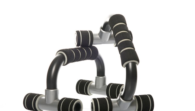 push-up bars with reflection in a studio
