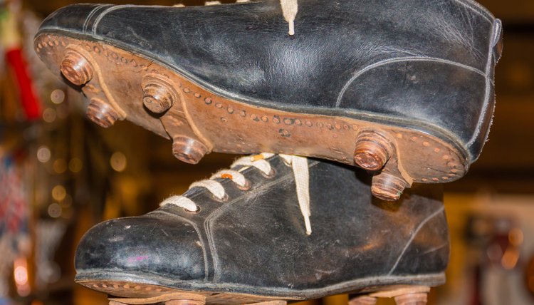 Old leather hanged soccer boots