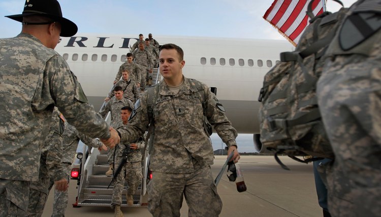 U.S. Army lieutenant being greeted upon return to home base at Fort Hood, TX.