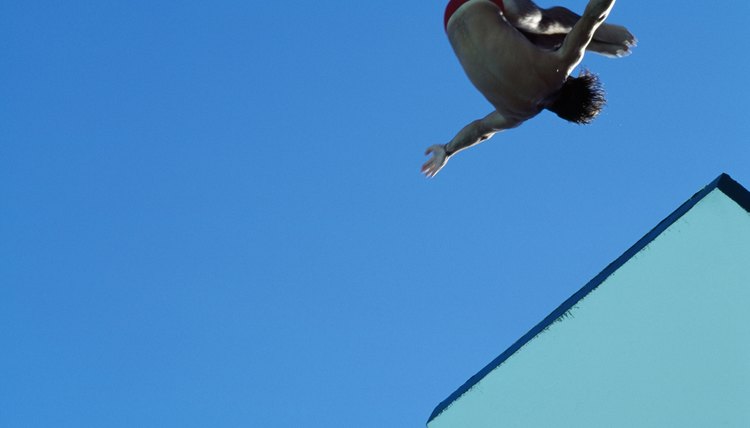 portrait of a man acrobatically diving