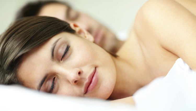 Close-up of a young couple sleeping