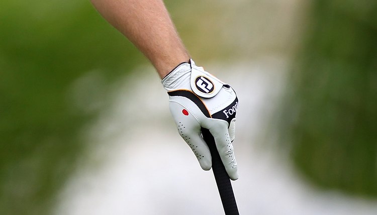A clean glove provides proper traction on the club.