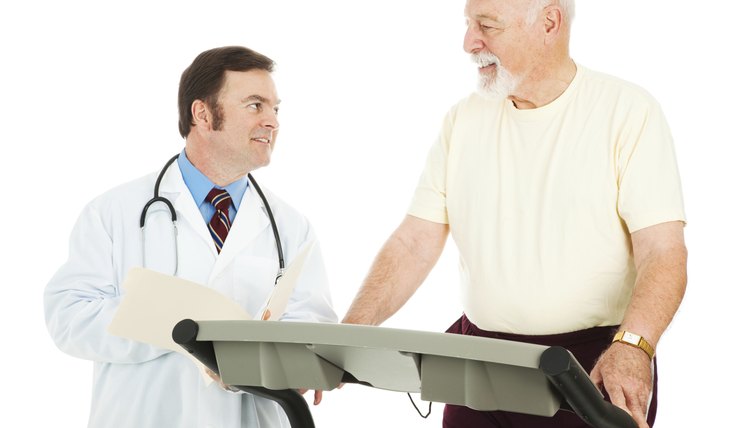 Fit Senior Man Consults Doctor
