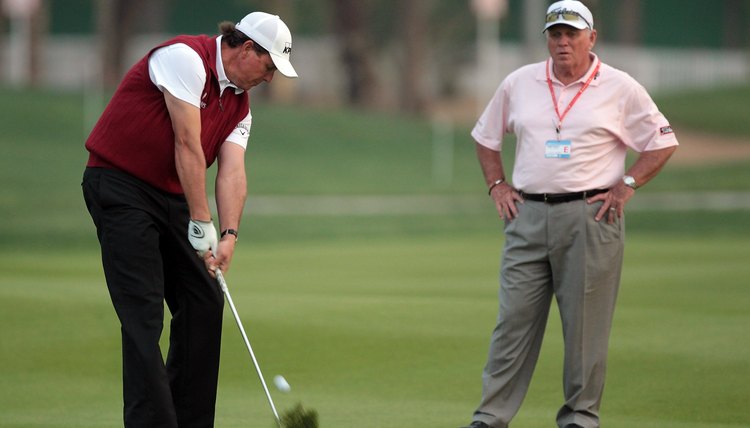 Long time pro instructor Butch Harmon helps Phil to hit the fairways in regulation.