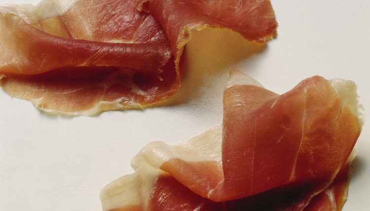 Prosciutto is usually served thinly sliced in antipasti.