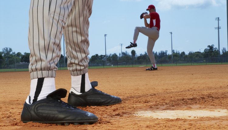 Baseball pitcher preparing to throw, low section