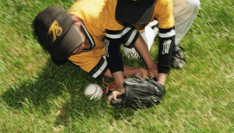 Two Boys Retrieving Baseball