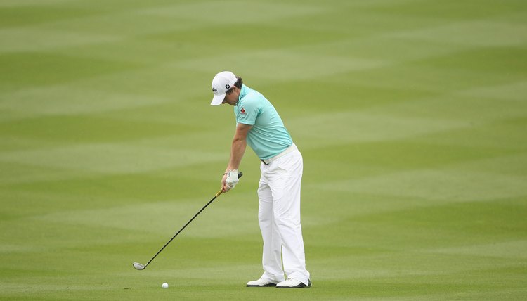 McIlroy begins his takeaway with his shoulders, not by lifting the club with his wrists.