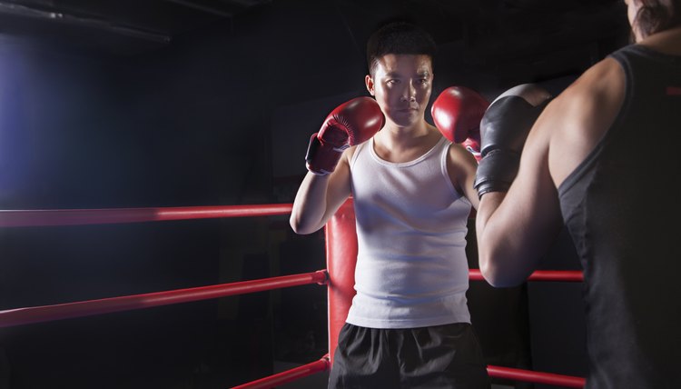 Two male boxers getting ready to box