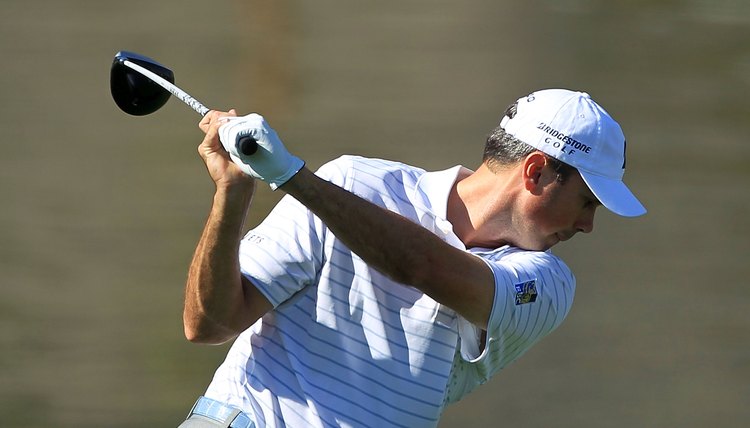 Matt Kuchar uses a rotary swing during a 2012 PGA Tour event. Note that his left arm is on the same plane as his shoulders.