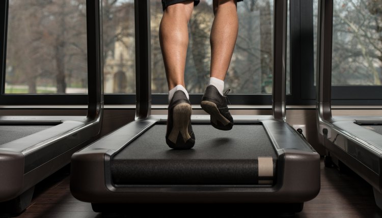 Man Feet On Treadmill