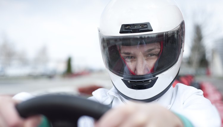 Go-cart driver looking at camera