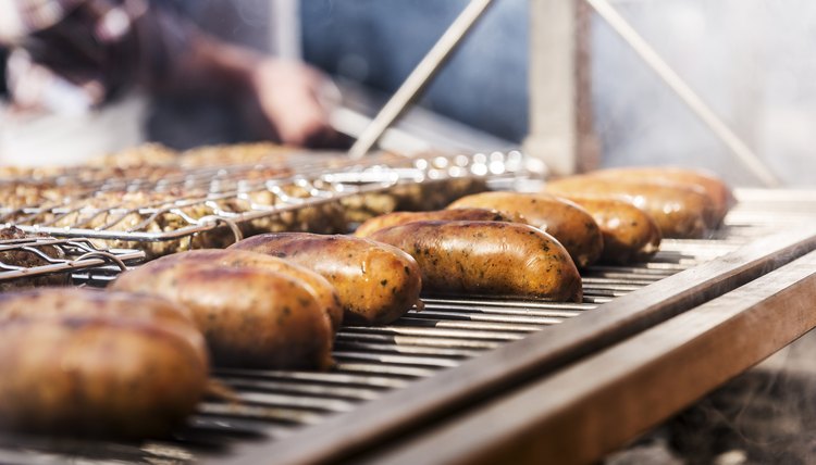 Sausage grilling on a barbecue.