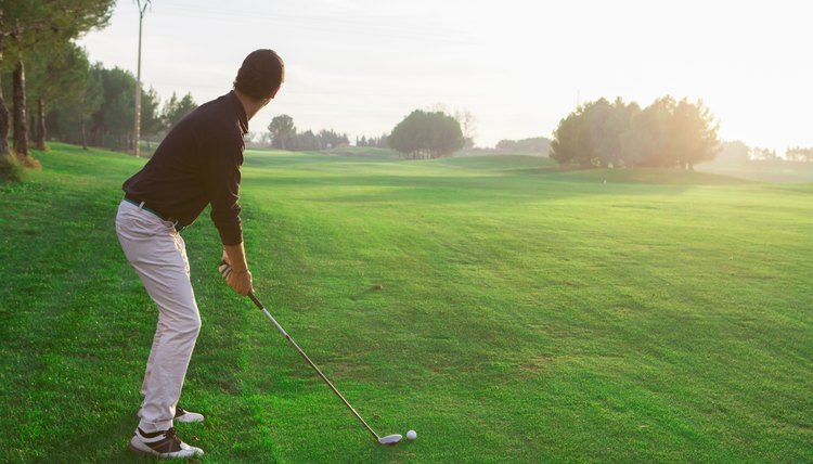 Golf drive during sunset