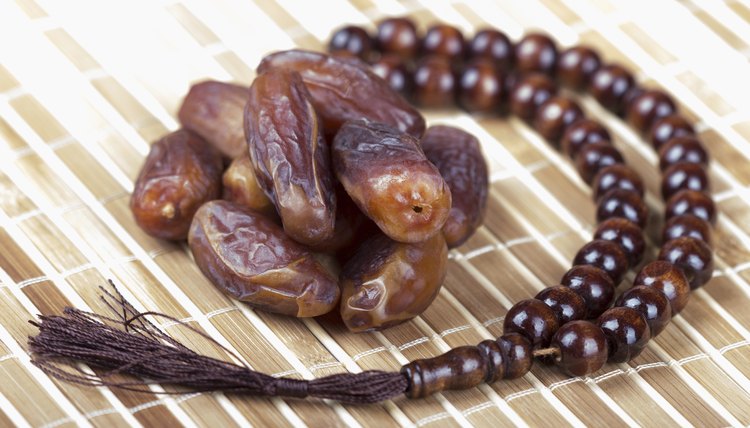 A prayer rug and beads is a useful gift.