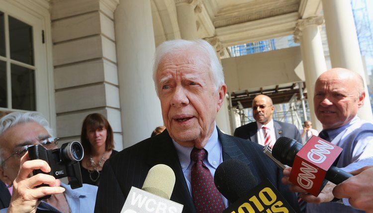 Jimmy Carter speaks to the media.