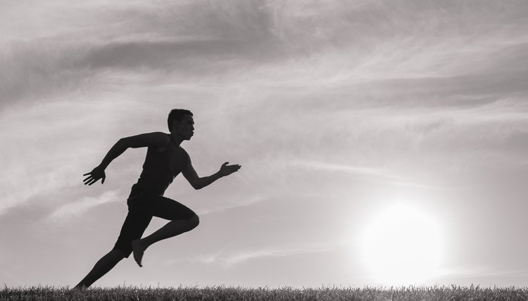Silhouette of young man running
