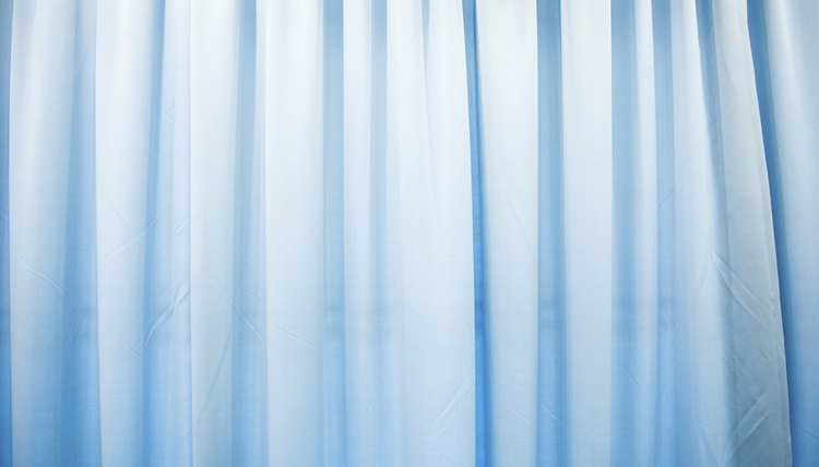 Blue curtains covering a window.