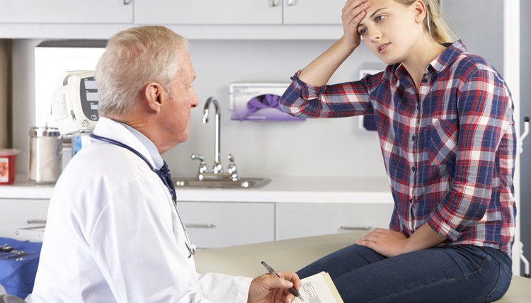 Teenage Girl Visits Doctor's Office With Headaches