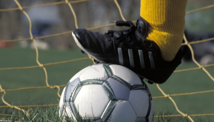 Goalie With Foot on a Soccer Ball