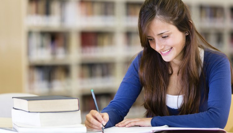 college student studying in library