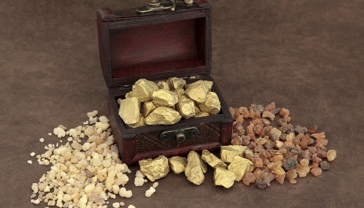 Gold, frankincense and myrrh in an old wooden box.