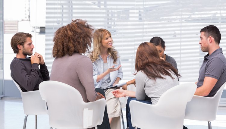 Group of adults sitting in a circle