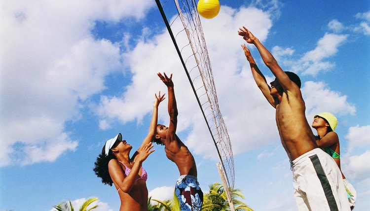 Teenagers Playing Volleyball