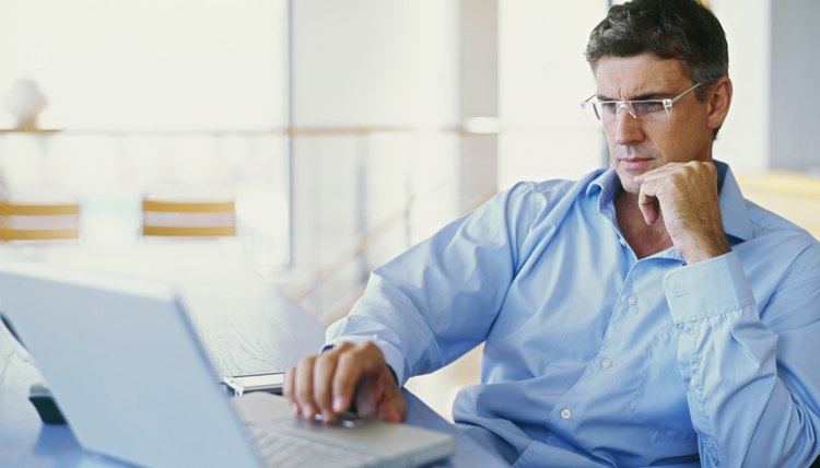 businessman using a laptop in an office