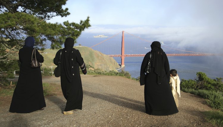 Muslim women are required to cover their entire bodies with the exception of the hands and face.