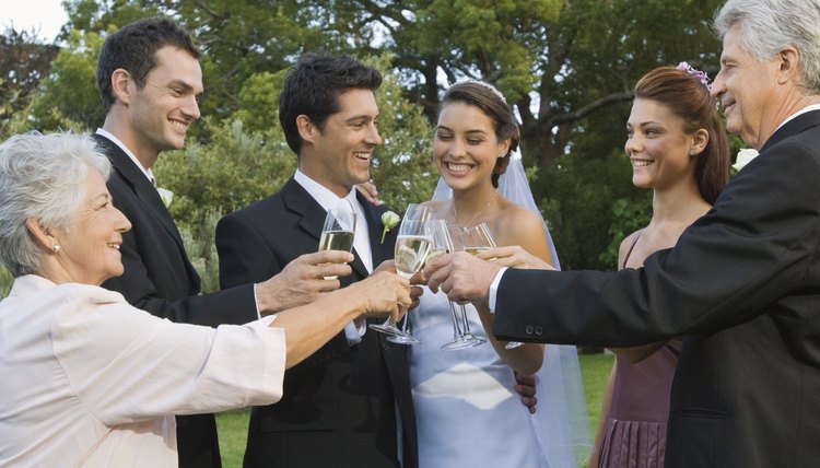 Orthodox sponsors actively participate in the wedding ceremony.