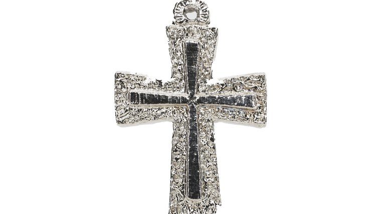 Pendants and charms can be engraved to commemorate the baptism.