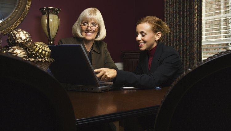 Businesswomen working with laptop