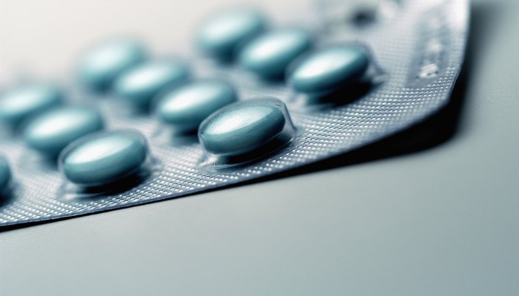 Foil pack of tablets, close-up, part of, selective focus