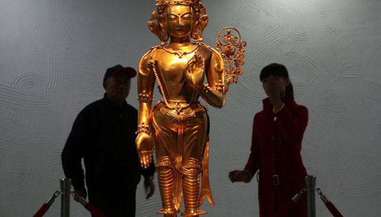 Statues of Guan Yin, the bodhisattva of compassion, are revered in Buddhist cultures.