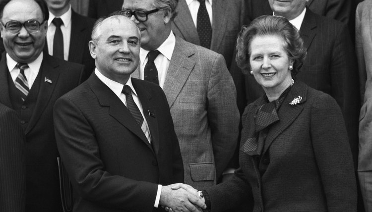 Soviet Politburo member Mikhail Gorbachev shakes hands with British Prime Minister Margaret Thatcher at Chequers on December 16, 1984.