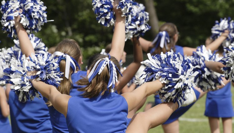 Cheerleaders Cheering at Football Game