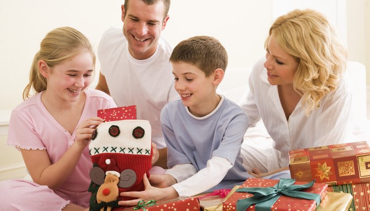 Add your youngster's favorite plush character to a personalized stocking gift bag.