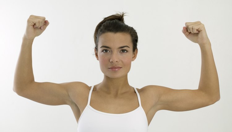 Woman flexing biceps
