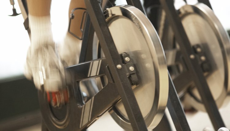 Low section view of a person on an exercise bike
