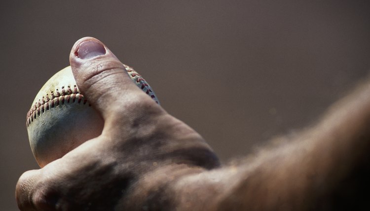 Hand of man holding baseball