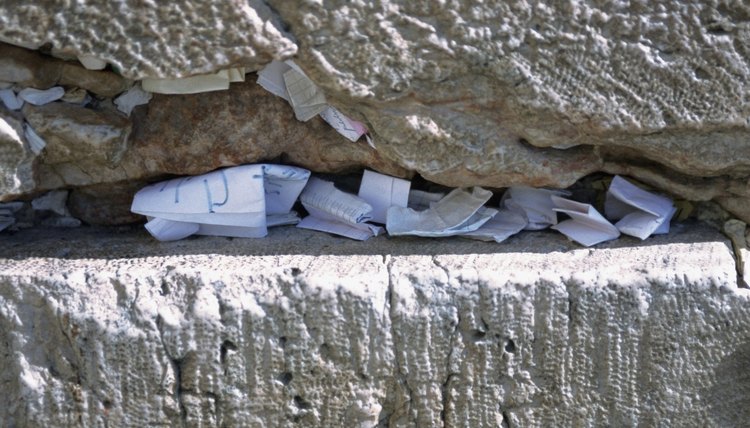 Prayers tucked into a crevice in the Western Wall.