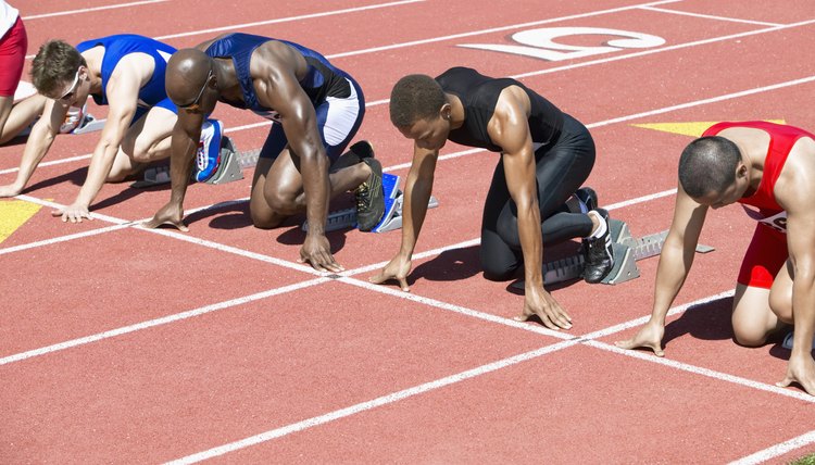 Runners Waiting in Starting Blocks