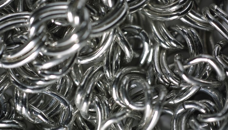 Loose electrons in metals give them a lustrous appearance.